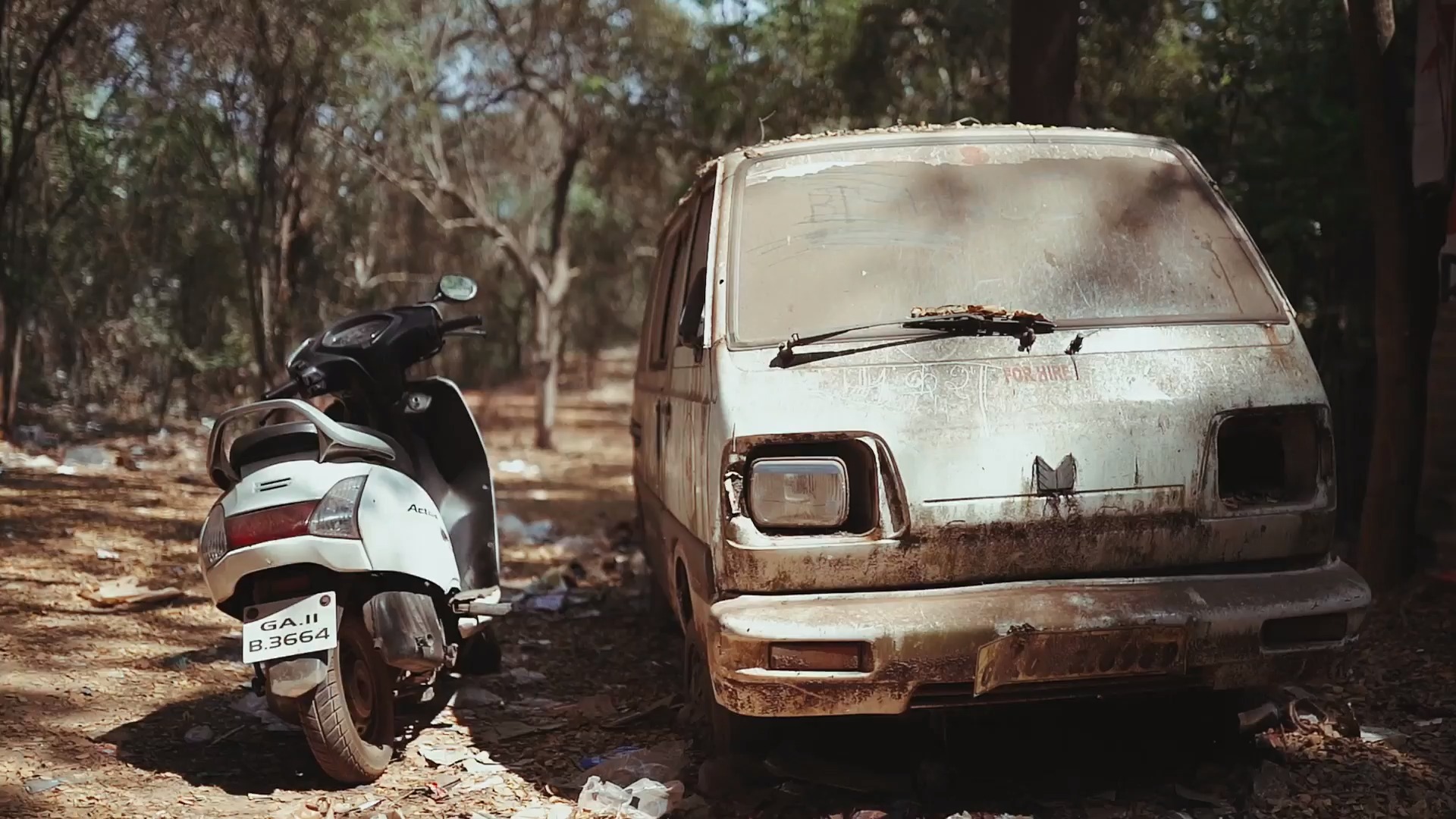 A dirty motorcycle and van that definitely need to call Brown and Kirk!